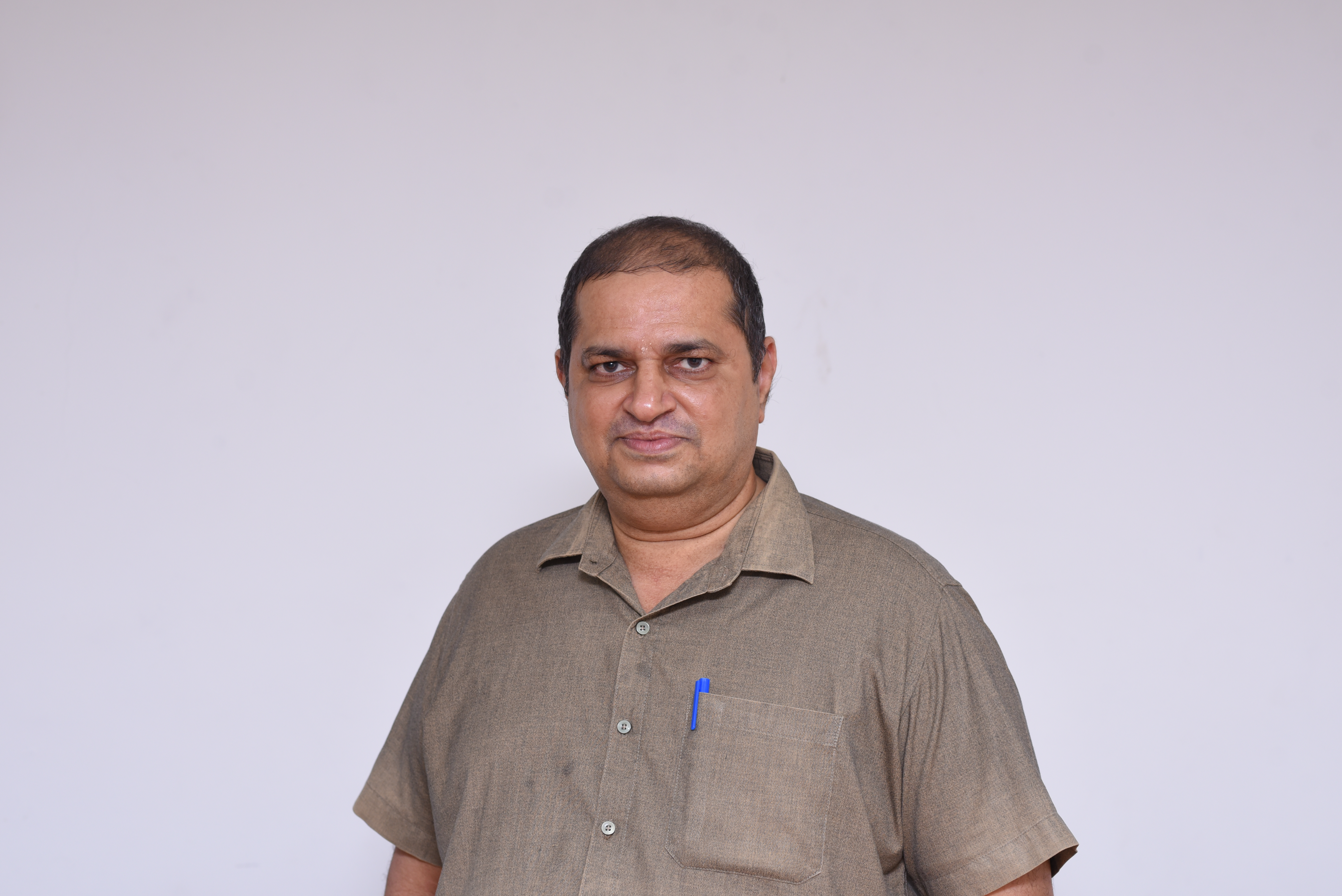 Photograph of Ashok Pai, General Manager
